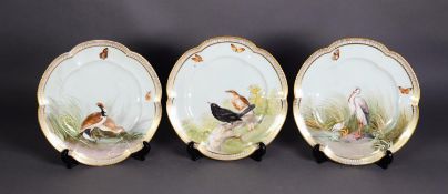 SET OF THREE NINETEENTH CENTURY HAND PAINTED CHINA DESSERT PLATES, each with scalloped edge, well