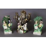 A PAIR OF STAFFORDSHIRE PEARLWARE BROCAGE GROUPS, c.1810, on square socle bases, plus a slightly