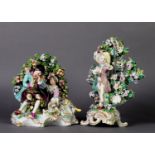 TWO SIMILAR 18TH CENTURY SOFT PASTE PORCELAIN BROCAGE GROUPS, the group modelled as a piper and