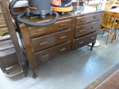 A MAHOGANY DRESSER SIDEBOARD WITH SIX SHORT DRAWERS, ON CABRIOLE LEGS