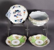 PAIR OF NINETEENTH CENTURY ROCKINGHAM PORCELAIN SINGLE HANDLED SERVING DISHES, each of shaped