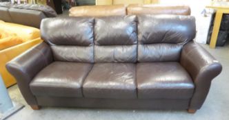 GOOD QUALITY 'HTL' THREE SEATER BROWN LEATHER SETTEE, IN GOOD CONDITION, STANDING ON WOODEN STUMP