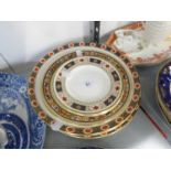 FIVE ROYAL CROWN DERBY CHINA SIDE PLATES WITH SPECIMEN BORDERS, 6 ½” DIAMETER AND TWO SPECIMEN