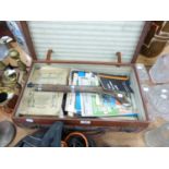 A VINTAGE SUITCASE WITH VARIOUS MAGAZINES AND NEWSPAPERS, TO INCLUDE MILITARY MAGAZINE AND REPLICA