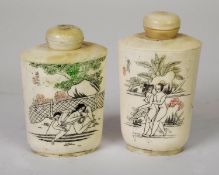 TWO MID TO LATE 2OTH CENTURY JAPANESE BONE EROTIC SNUFF BOTTLES, decorated with figures in varying