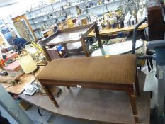 A DUET PIANO STOOL (A.F.), AN OAK TWO TIER TROLLEY (A.F.), AND A REPRODUCTION MAHOGANY OVAL COFFEE