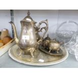 AN ELECTROPLATE TEA AND COFFEE SERVICE OF FOUR PIECES; AN ELECTROPLATE SMALL OVAL TRAY AND A