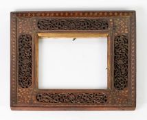 EARLY TWENTIETH CENTURY MIDDLE EASTERN ROSEWOOD AND GILT METAL INLAID SQUARE PICTURE FRAME, the