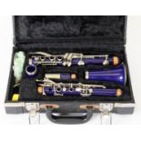 DY MUSICAL DESIGN U.S.A. FIVE-PART CLARINET, in sapphire blue, with plated metal mounts and keys, in