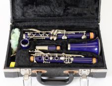DY MUSICAL DESIGN U.S.A. FIVE-PART CLARINET, in sapphire blue, with plated metal mounts and keys, in