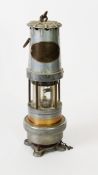 SPIRALARM EARLY 20th CENTURY BRASS AND ALUMINIUM MINER'S SAFETY LAMP by JH Naylor of Wogan, 11 3/4in