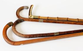 THREE VARIOUS BENTWOOD AND SILVER MOUNTED TRADITIONAL SHAPE WALKING STICKS, varying conditions and a