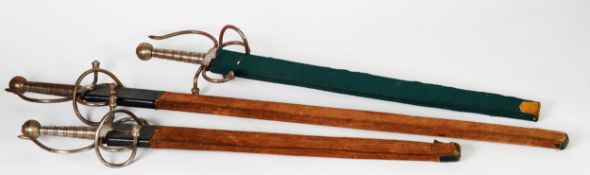 THREE REPRODUCTION ALL STEEL MEDIAEVAL STYLE BROADSWORDS, the largest 40in (101.5cm) long overall,