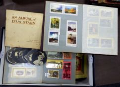 ELEVEN JOHN PLAYER AND SONS CIGARETTE CARDS ALBUMS, WITH CARD STUCK IN, subjects include; Film