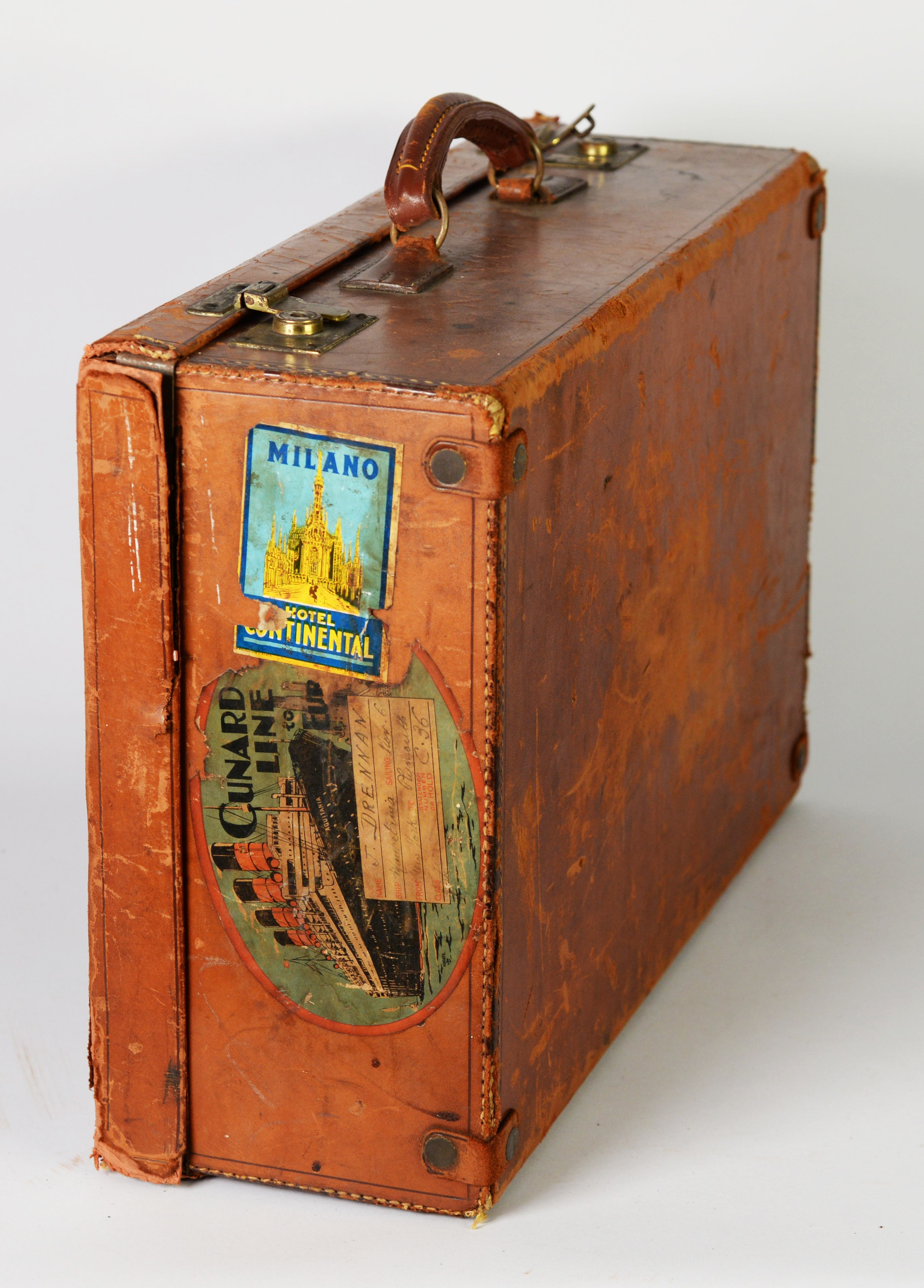 CIRCA 1930s SMALL BROWN LEATHER SUITCASE applied with Cunard Line oval label for travel to Europe