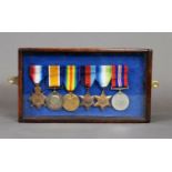 SMALL SLIDE FRONT WOOD AND GLAZED DISPLAY CASE CONTAINING SIX SERVICE MEDALS, WITH RIBBONS, three
