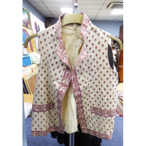 EASTERN PRINTED LINEN WAISTCOAT with small all-over pattern and floral and foliate print border