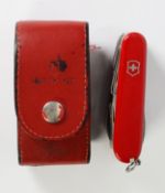 SWISS VICTORINOX MULTI-BLADED CLASP/POCKET KNIFE, implements include a pair of pliers, corkscrew,
