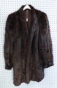 LADY'S DARK BROWN DYED ERMINE FUR COAT, three quarter length, with narrow shawl collar, triple