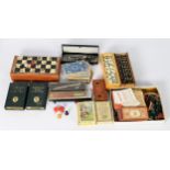 SIX MARTINS BANK BOOK-FORM MONEY BANKS/BOXES together with a selection of playing cards and games;