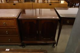 CHIPPENDALE STYLE FIGURED MAHOGANY SMALL CUPBOARD, WITH GADROON CARVED EDGES, TWO FRAMED PANEL