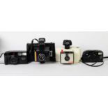 POLAROID SWINGER INSTANT CAMERA, in case; a POLAROID SUPER SWINGER III instant camera, in case; a