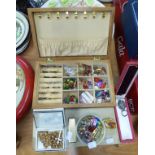 A WOODEN JEWELLERY CASE, CONTAINING A QUANTITY OF ENAMELLED AND OTHER EARRINGS