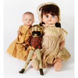 TWO CIRCA 1940's COMPOSITION DRESSED DOLLS, AND ANOTHER SOFT PLASTIC FACED TARTAN DRESSED TOY (3)