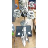 A SILVER COLOURED METAL FOUR BRANCH CANDELABRA, A CASED SET OF 12 EPNS TEA SPOONS, WITH SUGAR
