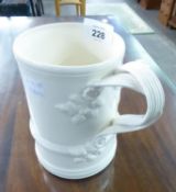 A MODERN LEEDS CREAM WARE QUART MUG, WITH REEDED DOUBLE STRAP HANDLE