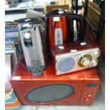 SPECTRUM RED CASE MICROWAVE OVEN; AN ELECTRIC CAN OPENER;KETTLE AND A GRUNDIG RADIO