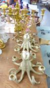 A PAIR OF GOLD COLOURED RESIN OCTOPUS CANDELABRUM, A GARNITURE OF THREE NATURALISTIC ORGANIC