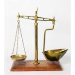 PAIR OF LATE VICTORIAN BRASS BEAM SCALES of typical form with produce bowl and weights pan,