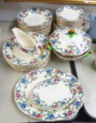 ROYAL CAULDON ‘VICTORIA’ PATTERN POTTERY DINNER SERVICE WITH PRINTED AND HAND-COLOURED FLORAL AND