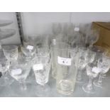 COLLECTION OF LEAD CRYSTAL AND DOMESTIC GLASS, INCLUDING; HIGH BALL TUMBLERS, CHAMPAGNE COUPES,