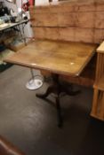 A NINETEENTH CENTURY SMALL OAK BREAKFAST TABLE, WITH RECTANGULAR TOP, ON TURNED COLUMN AND TRI-POD