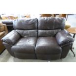 A BROWN LEATHER TWO SEATER RECLINING SETTEE