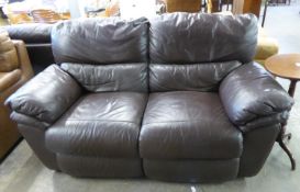 A BROWN LEATHER TWO SEATER RECLINING SETTEE