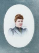 A LATE 19TH CENTURY GERMAN PORCELAIN PLAQUE BY ANNE NICOLE VOULLEMIER, depicting a governess, signed