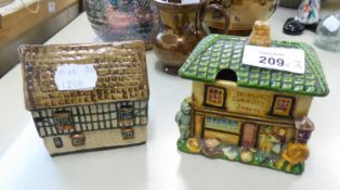 TEY POTTERY MODEL OF THE OLD PARLIAMENT HOUSE GLOUCESTER AND A JAPANESE POTTERY COTTAGE JAM POT