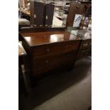 A STAINED MAHOGANY CHEST OF THREE LONG DRAWERS, ON BRACKET FEET