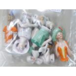 SEVEN CERAMIC HALF DOLL FIGURES (7)