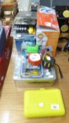 LAZER SPIRIT LEVEL AND A TIN CONTAINING SOME HAND TOOLS, STANLEY COMPACT SOCKET SET, (ON CARD AS
