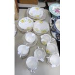 BELL CHINA TEA SERVICE, ORIGINALLY FOR TWELVE PERSONS, 10 CUPS, 11 SAUCERS, 12 SIDE PLATES, A