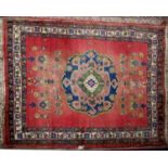 AFSHAR, PERSIAN RUG with concentric circular centre medallion with long pendants, each flanked by