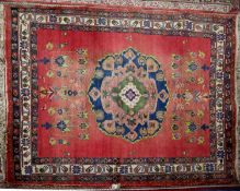 AFSHAR, PERSIAN RUG with concentric circular centre medallion with long pendants, each flanked by