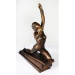 REPRODUCTION PATINATED BRONZE ART DECO FEMALE FIGURE, modelled in a stylised, kneeling pose with