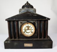 EDWARDIAN BLACK SLATE PRESENTATION MANTLE CLOCK, the 5” Roman dial with visible brocot escapement to