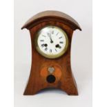 ARTS AND CRAFTS INLAID MAHOGANY MANTLE CLOCK, the 4” enamelled Roman dial powered by a drum shaped