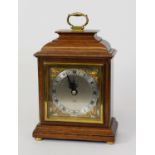 PRESENTATION ELLIOTT SMALL MANTLE CLOCK, RETAILED BY GARRARD & Co Ltd, the silvered dial with